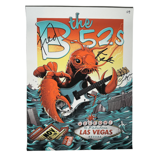 Vegas event poster featuring vibrant orange lobster playing white electric guitar with las vegas skyline for B-52s fans