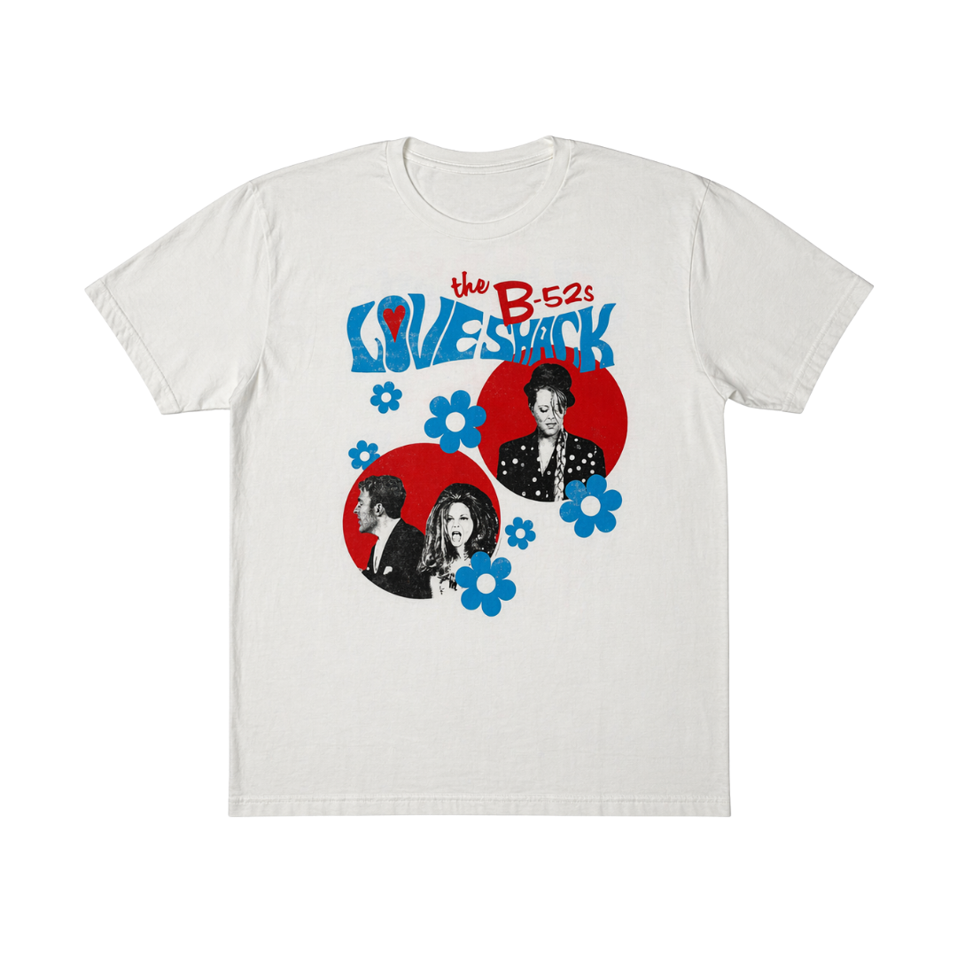 White cotton flower vegas tour tee featuring a vibrant b-52s graphic with blue flowers and red circular backgrounds