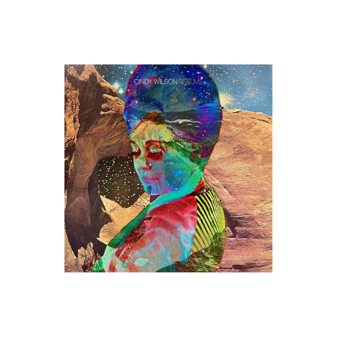 Vibrant digital collage album cover of realms cd featuring cindy wilson with cosmic galaxy colors b-52s official store