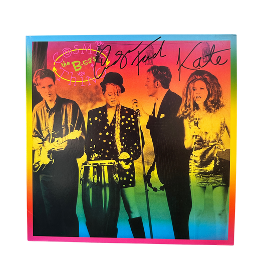 Signed cosmic thing vinyl album cover by the b-52s with vibrant rainbow borders and colorful band attire