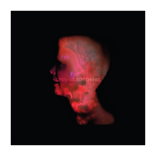A glowing red and pink digital skull with glitchy texture on the signed change vinyl by cindy wilson b-52s