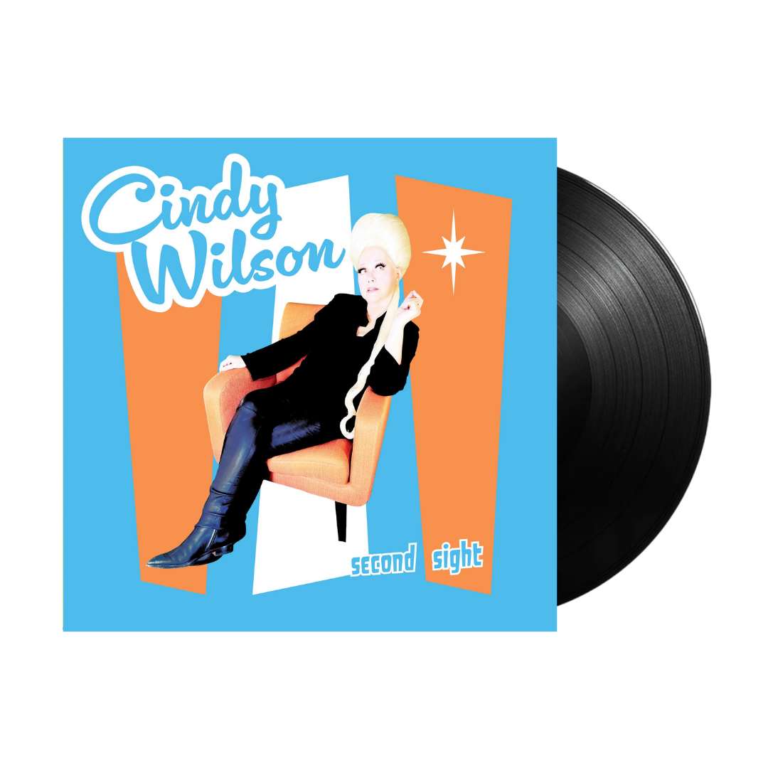 Second sight vinyl record featuring a vibrant blue and orange cover with an illustrated portrait of cindy wilson