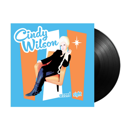 Second sight vinyl record featuring a vibrant blue and orange cover with an illustrated portrait of cindy wilson