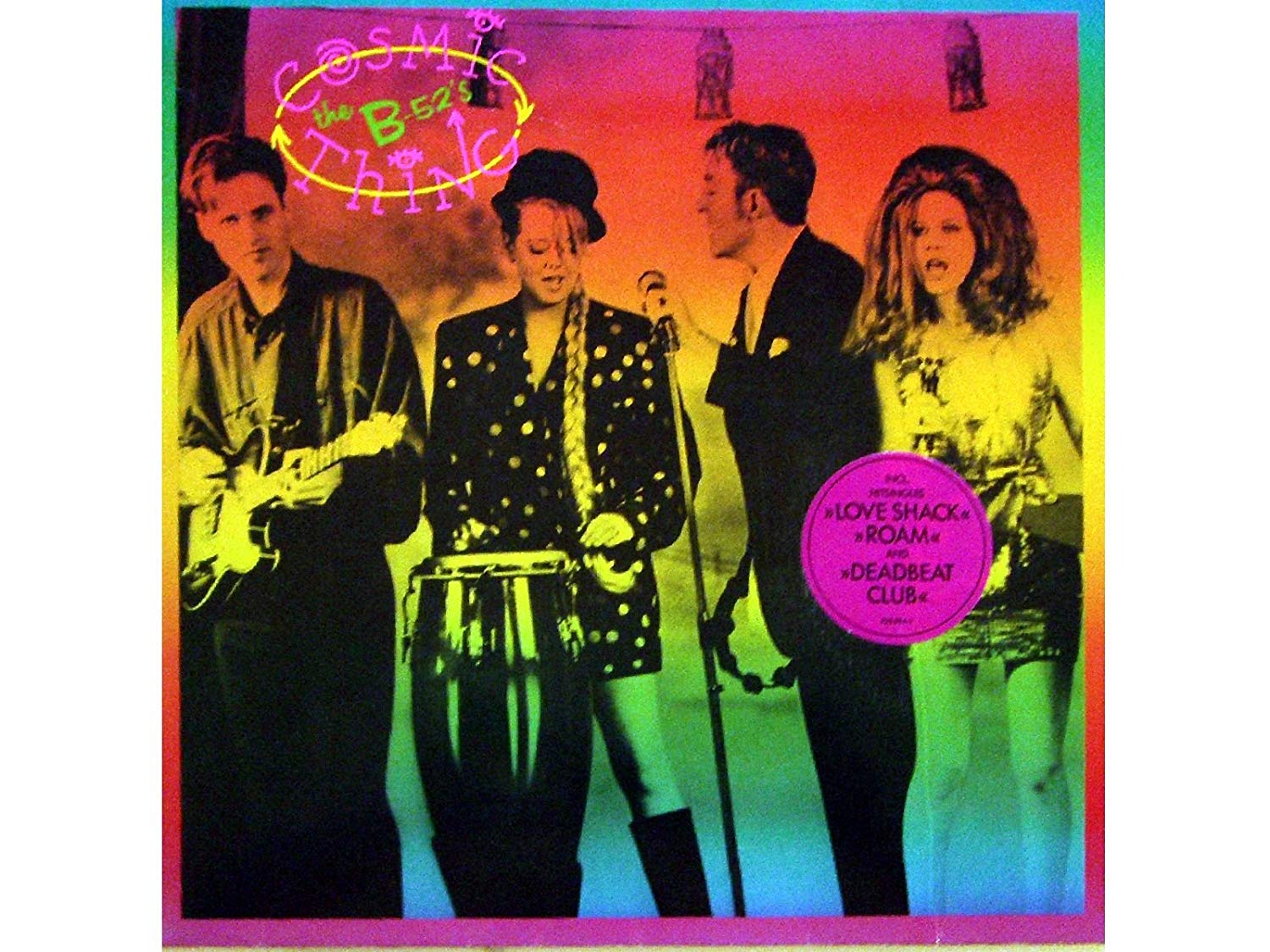 Album cover for ’Cosmic Thing’ by The B-52’s featuring four band members against a colorful gradient background.