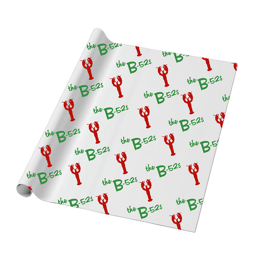 Roll of wrapping paper with a repeating pattern of ’the B-52s’ text in green and red lobster illustrations.