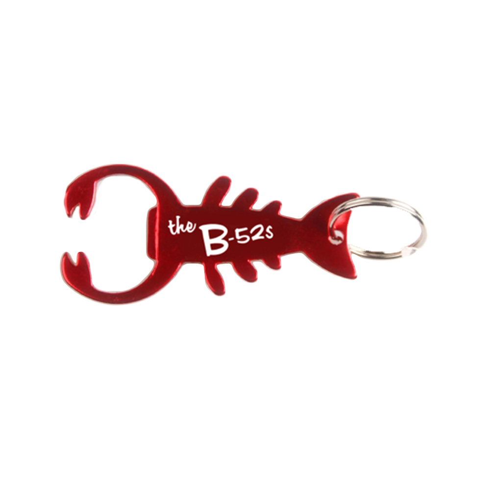 Red lobster-shaped bottle opener keychain with ’the B-52s’ text.