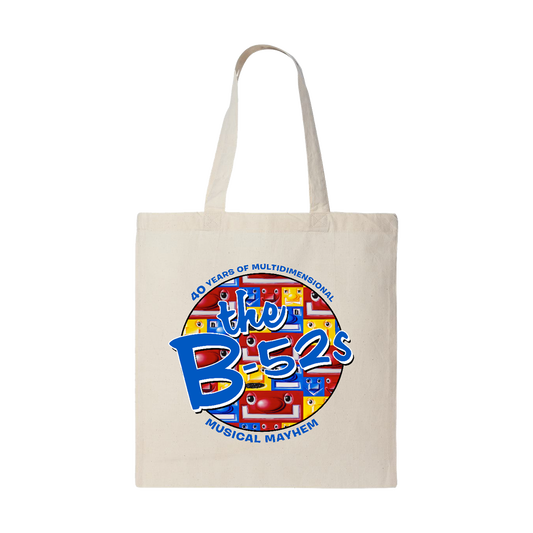 Canvas tote bag with a colorful ’The B-52’s’ band logo design.