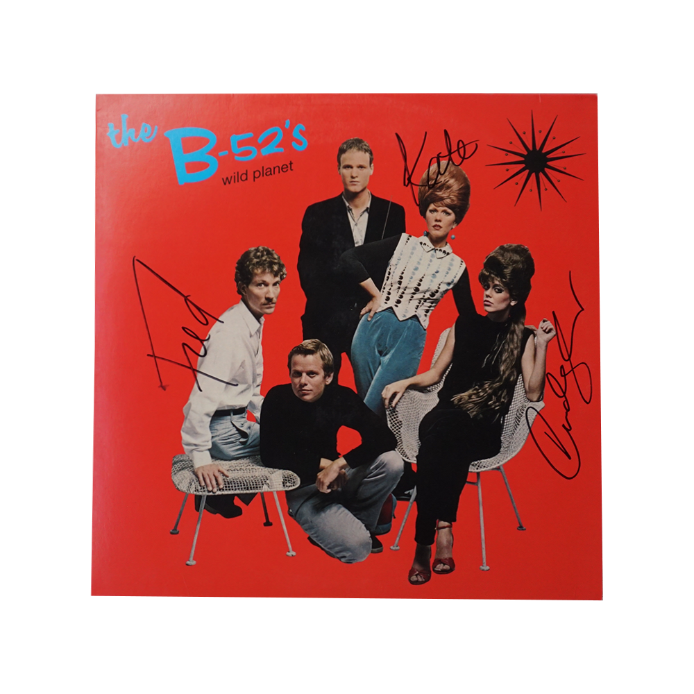 Signed red vinyl record album cover for the b-52s wild planet vinyl featuring collectible planet vinyl artwork