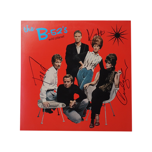 Signed red vinyl record album cover for the b-52s wild planet vinyl featuring collectible planet vinyl artwork